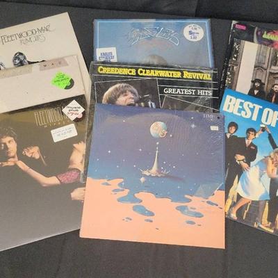 Vinyl Records | 9 LP Albums by Fleetwood Mac, Eagles, CCR, ELO, Blondie & More