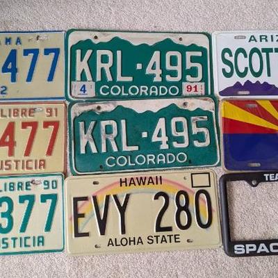 KKT153 - Seven Vintage Collectible Metal License Plates, a Frame and More
