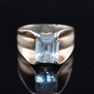 Sterling Silver 3 Carat Emerald-Cut Blue Topaz Grasped Ring