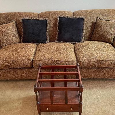 Paisley Patterned Couch With Vintage Magazine Rack