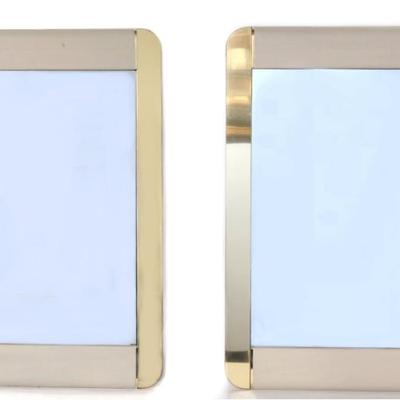 Sale Photo Thumbnail #231: Lot 231 pair of mid century italian style satin metal wall mirrors