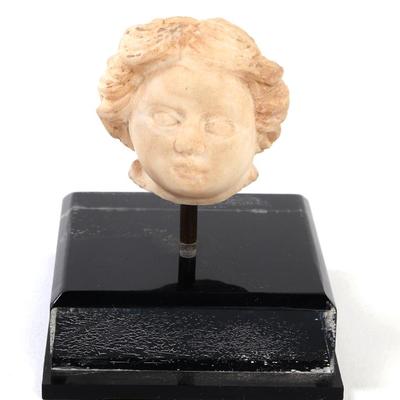Sale Photo Thumbnail #150: Lot 150 roman marble head of cherub wstand