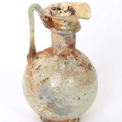 Sale Photo Thumbnail #154: Lot 154 roman green glass trefoil oinochoe 2nd 3rd ad