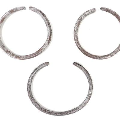 Sale Photo Thumbnail #120: Lot 120 group of three medieval incised bracelets