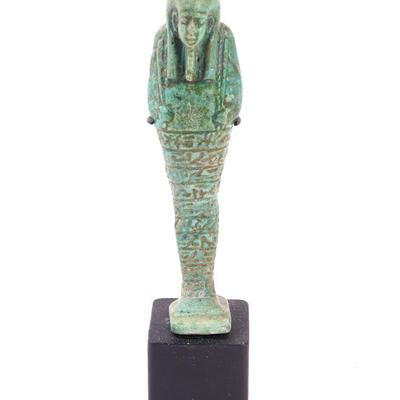 Sale Photo Thumbnail #148: Lot 148 egyptian turquoise glazed faience ushabti wstand