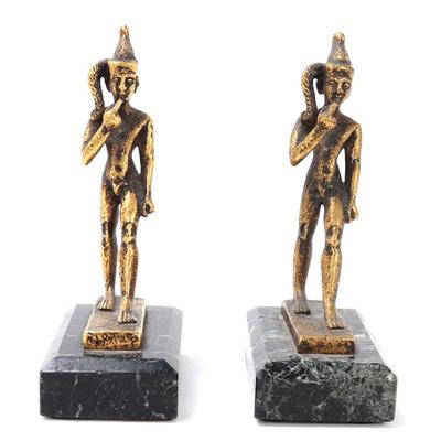 Sale Photo Thumbnail #215: Lot 215 fine pair of brass harpocrates bookends on marble
