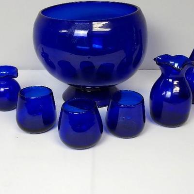 Blue Glass Bowl, Cups, Pitcher, and Vases