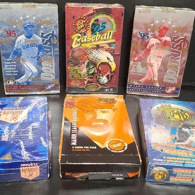 Pinnacle, Donruss, And Topps Baseball Card Boxes Featuring 1995 Series Sets