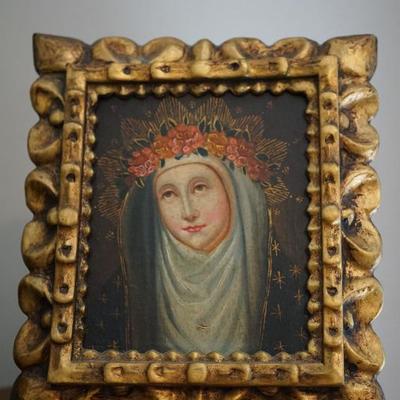 This appears to be a Mexican painting framed in a wood carved Mexican frame. I believe the painting is made to look old. The wood it is...