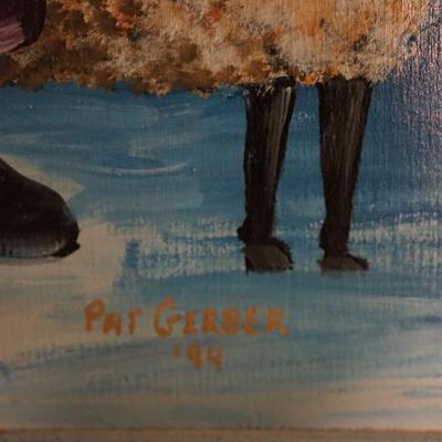 Signed paintings on wood of Santas.Very well done and signed. originals