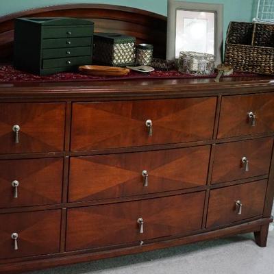 Nine drawer contemporary dresser / has mirror but most like to put a piece of art above. Quality and priced to sell. 