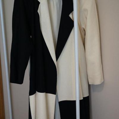 Mixed in with the several hundred articles of clothing is this stylish coat from Carmens. More of this hidden in the closets. 