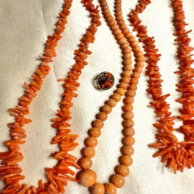 Two branch coral and coral glass beaded necklaces