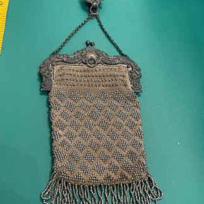 Tiny silvertone bag with german silver handle