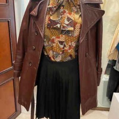 Leather jacket silk skirt, and polyester shirt
