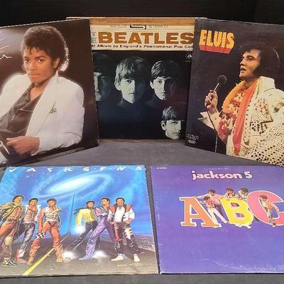 Iconic Vinyl Record Collection Featuring Michael Jackson, The Beatles, Elvis & More