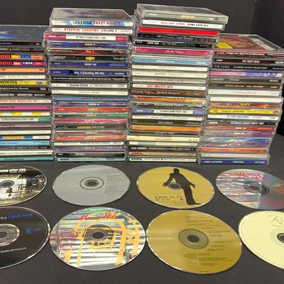 Extensive Music CD Collection Featuring Reba, Mariah Carey, Garth Brooks & More