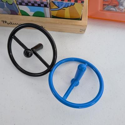 A fun pair of plastic wheels perfect for imaginative dramatic play (driving, flying) or as sensory tools for spinning and fine motor...