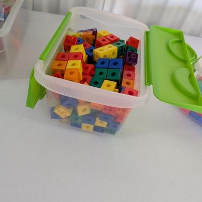 Colorful Linking Cubes / Unifix Cubes in Storage Bin: A large collection of durable, colorful linking cubes (also known as Unifix or snap...
