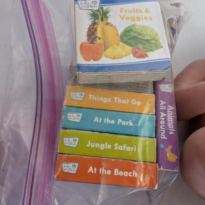 A colorful collection of 6 durable Baby Einstein board books, featuring engaging themes like "Fruits & Veggies,"...