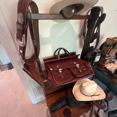 Sale Photo Thumbnail #32: Custom wall gun rack, tooled leather briefcase, gun holsters, horse gear
