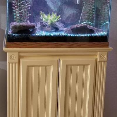 Aquarium w pump and cabinet. 