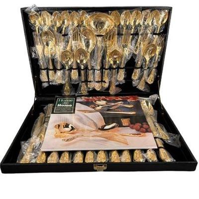 Lot 192  
Home to Home Gold Tone Flatware, New