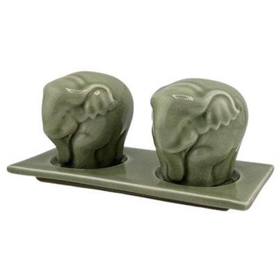 Lot 100-018  s)
Celedon Style Contemporary Elephant Salt and Pepper Shakers