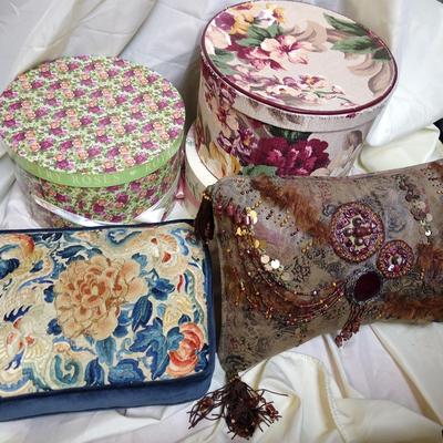 Lot of pillows and hat boxes
