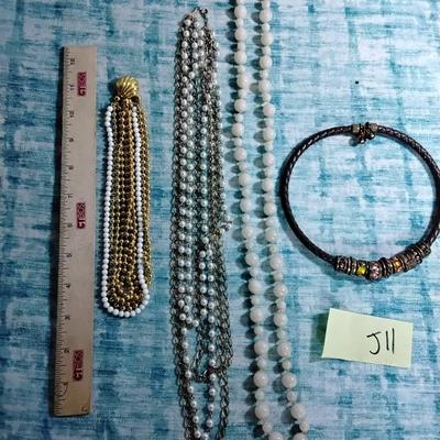 3 Necklaces And A Choker 