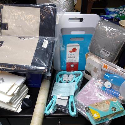 Lot of new in package items including cutting boards