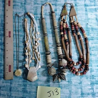 Lot Of Necklaces Including A Carved Pendant 
