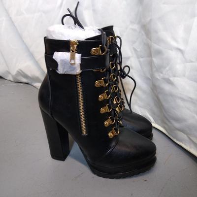 Black high heel boots size 6