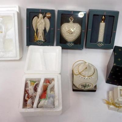 Sale Photo Thumbnail #91: 1091	LENOX CHINA CHRISTMAS ORNAMENT ASSORTMENT, 7 INCLUDING ANNUALS, CHRISTMAS VILLAGE, SAMPLE M SANTA M I K, AND OTHERS
