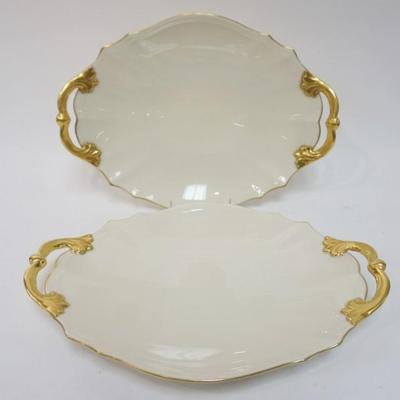 Sale Photo Thumbnail #73: 1073	LENOX CHINA LARGE GILT RIMMED DOUBLE HANDLED SERVING TRAYS, APPROXIMATELY 16 1/4 IN X 12 IN X 3 IN H
