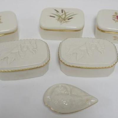 Sale Photo Thumbnail #47: 1047	8 LENOX CHINA ASSORTED COVERED TRINKET BOXES, ALL WITH GOLD TRIM, SOME EMBOSSED WITH CHERUBS AND FLORAL DECORATED, LARGEST APPROXIMATELY 6 IN X 4 IN X 2
