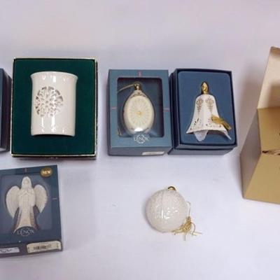 Sale Photo Thumbnail #99: 1099	LENOX CHINA CHRISTMAS ORNAMENT ASSORTMENT, 6 INCLUDING ANNUALS, CANDLE LAMP, BELL, ANGEL AND OTHERS
