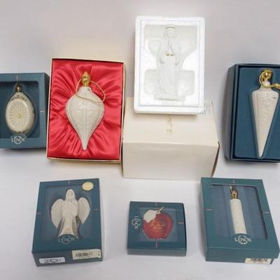 Sale Photo Thumbnail #98: 1098	LENOX CHINA CHRISTMAS ORNAMENT ASSORTMENT, 7 INCLUDING ANNUALS, TEAR DROO, FAVORITE TEACHER, ANGEL, AND OTHERS
