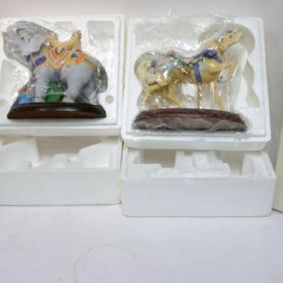 Sale Photo Thumbnail #173: 1173	LENOX CHINA *THE CAROUSEL COLLECTION* ELEPHANT & CIRCUS HORSE, EACH APPROXIMATELY 8 IN HIGH
