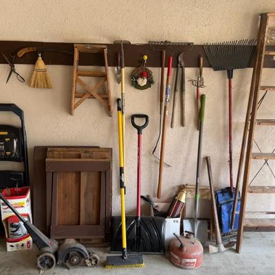 Garage Wall Cleanout With Lawn Tools, Ladder, Etc