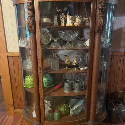 Antique Oak Bow Front China Cabinet with lion heads and claw feet 