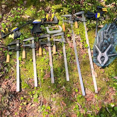 A Collection of Woodworking Bar Clamps and Quick-Grip Clamps