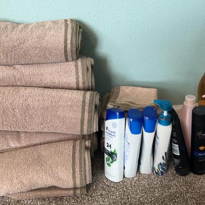 Set Of Matching Bath, Hand, And Face Towels + Multiple Bottles Of Shampoo And Conditioner