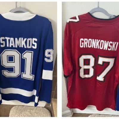 Red Buccaneers Jersey #87 Gronkowski
Tampa Bay & Lightning Jersey #91 Stamkos 
Both XL