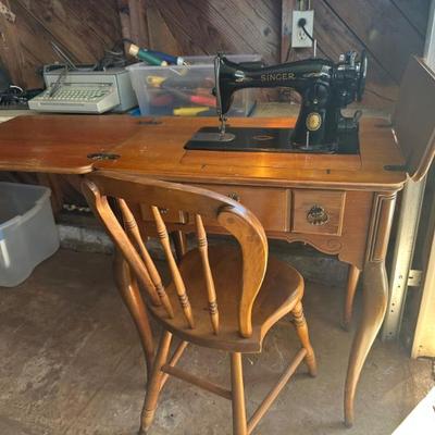 Sale Photo Thumbnail #19: Singer sewing machine w matching chair 
 excellent condition ! 
AL508000
Everything works ! 