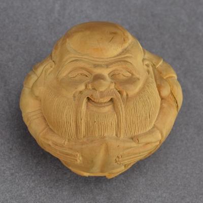 Carved Round Wooden Buddha