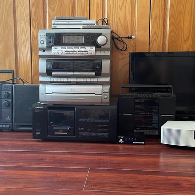 Collection Of CD, DVD, TVs, radio/Alarm