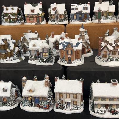 Twenty-four Thomas Kinkade’s Winter Memories Ornaments.