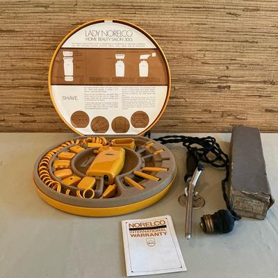 Ladies Vintage Norelco And Curling Iron 