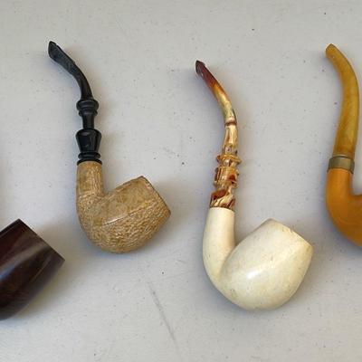 Corsica Giants and Ornate Smoking Pipes 